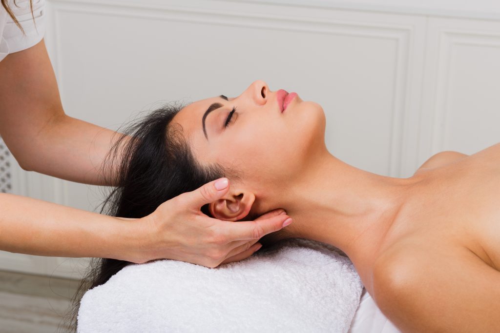woman receiving indian head massage